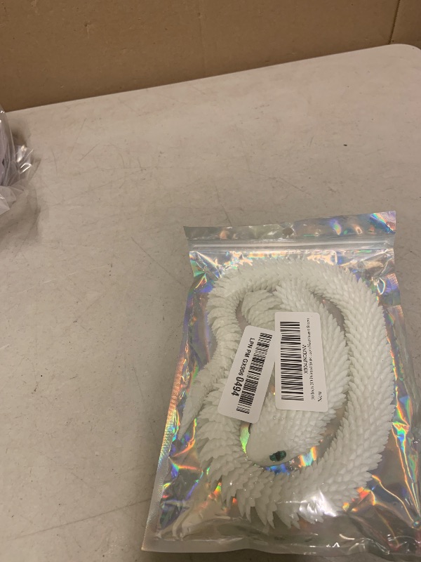 Photo 1 of 30 Inch 3D Printed Snake - Movable Articulated Snake, Perfect 3D Printed Animals for Educational Toys! Must-Have Toys for Kids and Collectors, Home Office Executive Desk Decor (Noctilucent Green)