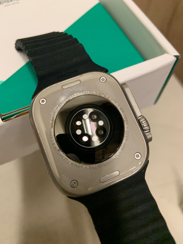 Photo 1 of Apple Watch Ultra [GPS + Cellular 49mm] Titanium Case with Midnight Ocean Band, One Size (Renewed Premium)