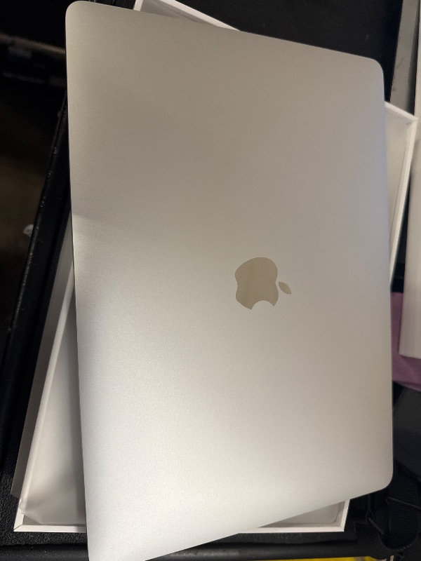 Photo 1 of 2020 Apple MacBook Air Laptop: Apple M1 Chip, 13” Retina Display, 8GB RAM, 256GB SSD Storage, Backlit Keyboard, FaceTime HD Camera, Touch ID. Works with iPhone/iPad; Silver