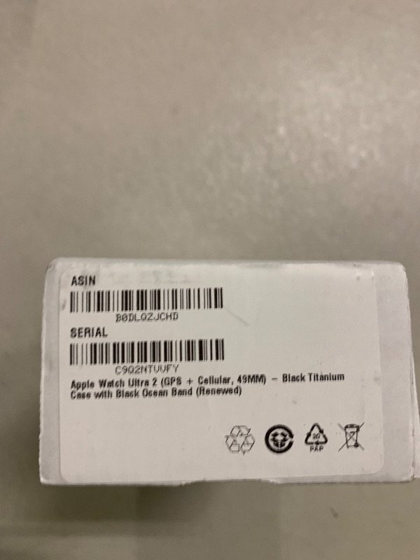 Photo 1 of Apple Watch Ultra 2 (GPS + Cellular, 49MM) - Black Titanium Case with Black Ocean Band (Renewed)
