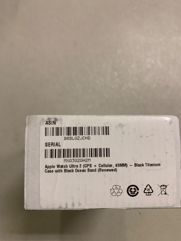 Photo 1 of Apple Watch Ultra 2 (GPS + Cellular, 49MM) - Black Titanium Case with Black Ocean Band (Renewed)