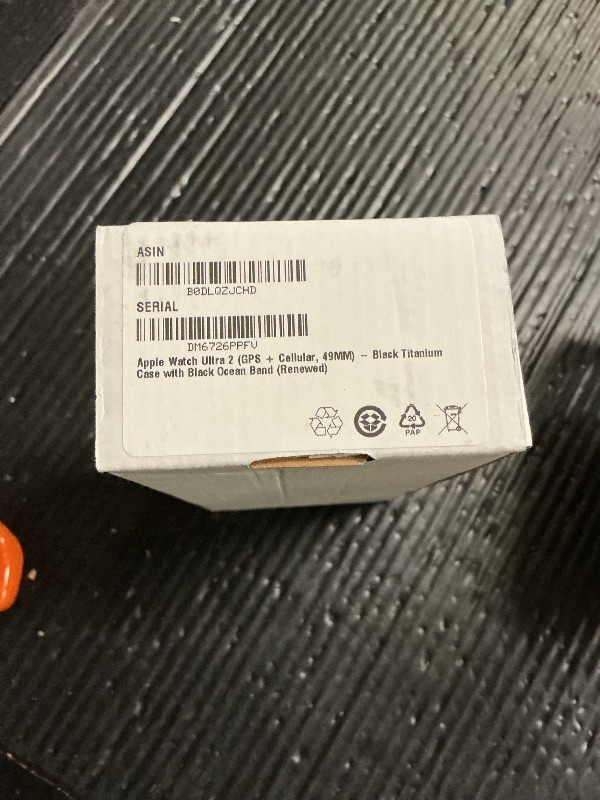 Photo 1 of Apple Watch Ultra 2 (GPS + Cellular, 49MM) - Black Titanium Case with Black Ocean Band (Renewed)