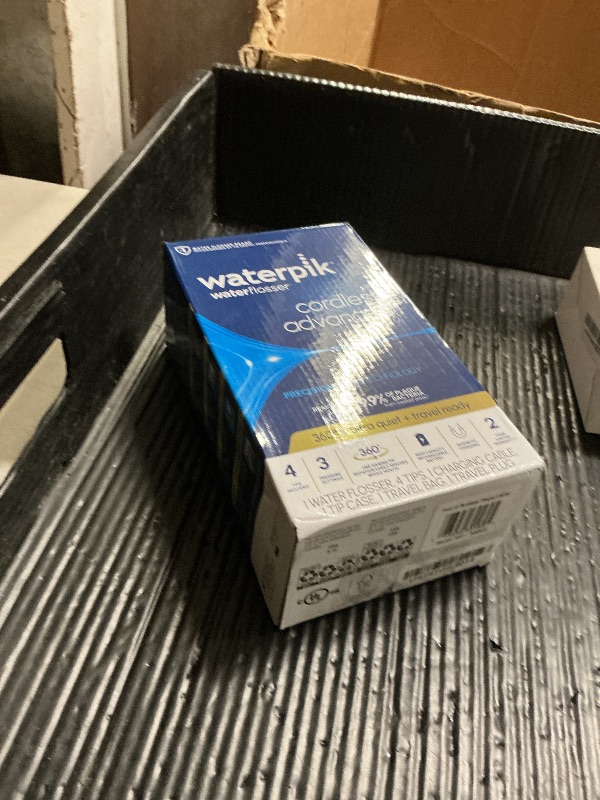 Photo 1 of Waterpik Cordless Advanced 2.0 Water Flosser For Teeth, Gums, Braces, Dental Care With Travel Bag and 4 Tips, ADA Accepted, Rechargeable, Portable, and Waterproof, White WP-580, Packaging May Vary