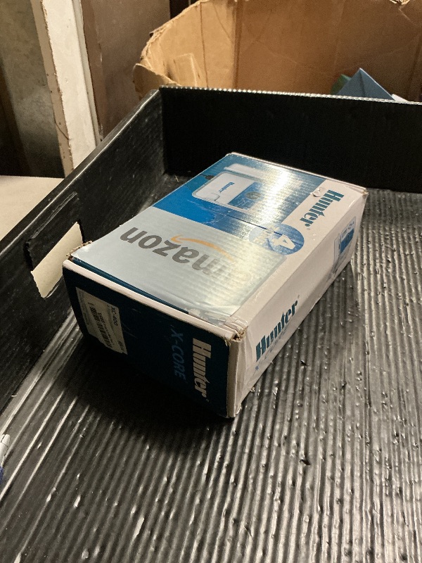 Photo 1 of Hunter X-Core XC400 4 Zone Outdoor Sprinkler Controller, Weather-Resistant Irrigation Timer for Lawn and Garden, Easy Install, Automatic Watering System