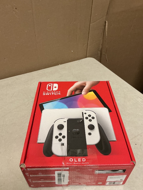 Photo 1 of Nintendo Switch – OLED Model w/White Joy-Con