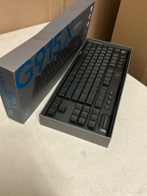 Photo 1 of Logitech G915 X Lightspeed TKL Low-Profile Wireless Gaming Keyboard, Double-Shot PBT Keycaps, Fully Programmable Keys, RGB Backlighting, Sleek Aluminum Finishing, GL Brown Tactile - PC/Mac - Black