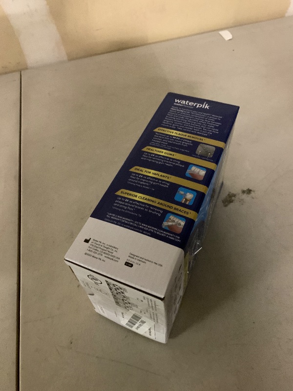 Photo 1 of Waterpik Cordless Advanced 2.0 Water Flosser For Teeth, Gums, Braces, Dental Care With Travel Bag and 4 Tips, ADA Accepted, Rechargeable, Portable, and Waterproof, Blue WP-583, Packaging May Vary