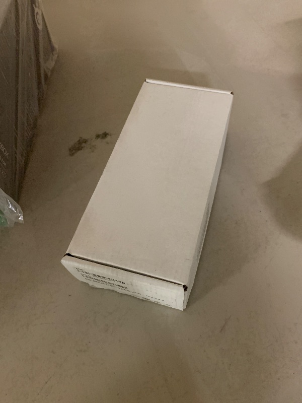 Photo 1 of Apple Watch Ultra 2 (GPS + Cellular, 49MM) - Black Titanium Case with Black Ocean Band (Renewed)