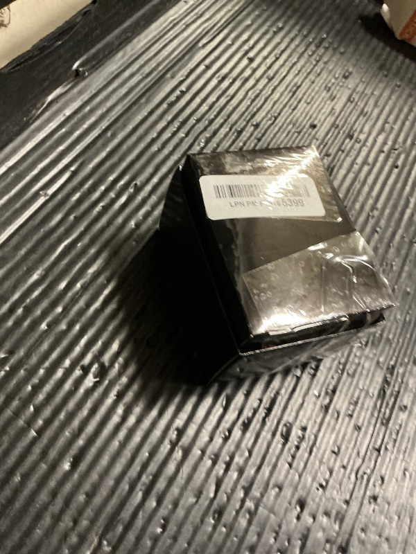 Photo 1 of GUESS Gold-Tone Stainless Steel + Black Stain Resistant Watch with Day + Date Functions. Color: Black (Model: U1053L7)