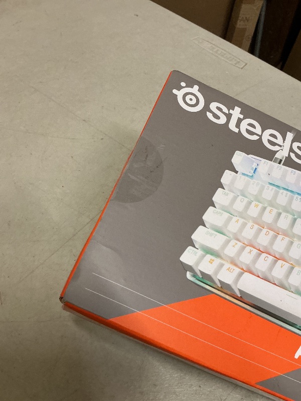Photo 1 of SteelSeries Apex Pro TKL Gen 3 White OmniPoint 3.0 Switches — Adjustable Actuation — Rapid Trigger — Game-Ready Presets — Protection Mode — Rapid Tap/SOCD — OLED — RGB — PBT Keycaps — USB-C