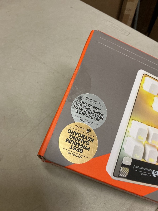 Photo 1 of SteelSeries Apex Pro TKL Gen 3 White OmniPoint 3.0 Switches — Adjustable Actuation — Rapid Trigger — Game-Ready Presets — Protection Mode — Rapid Tap/SOCD — OLED — RGB — PBT Keycaps — USB-C