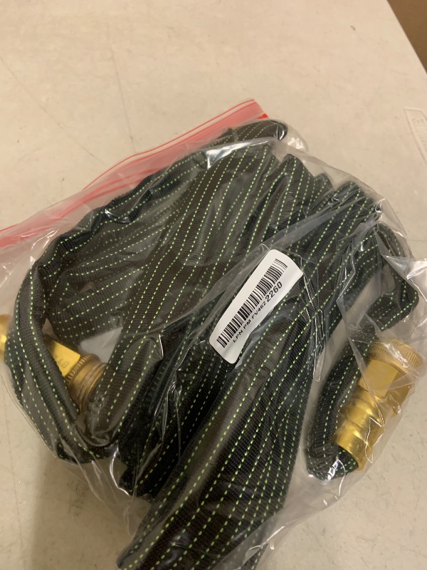 Photo 1 of 10FT Lightweight Garden Hose,Flexible Water Hose with Solid Brass Head,Kink-Free,Collapsible Hose,High Pressure Flat Water Hose for RV,Boat,Car Wash,Garden,Yard,Camper,Outdoor (Green-Black, 10 Feet)