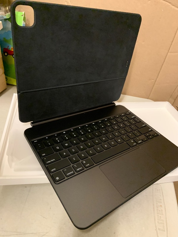 Photo 1 of Apple iPad Magic Keyboard Case for iPad Pro 13-inch (M4 and M5), Great Typing Experience, Built-in Trackpad, Function Row, US English - Black