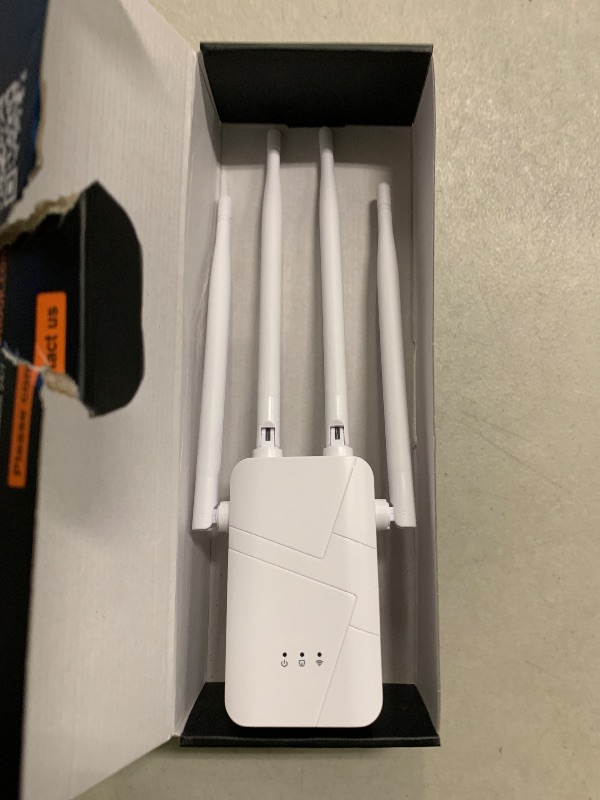 Photo 1 of WiFi Router Repeater