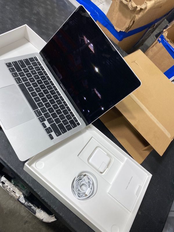 Photo 1 of 2020 Apple MacBook Air Laptop: Apple M1 Chip, 13” Retina Display, 8GB RAM, 256GB SSD Storage, Backlit Keyboard, FaceTime HD Camera, Touch ID. Works with iPhone/iPad; Silver