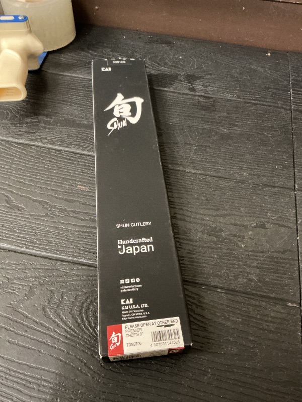 Photo 1 of Shun Premier 8" Chef's Knife, Handcrafted Japanese Kitchen Knife for Professional and Home Chefs, VG-MAX Core with Damascus Stainless Steel Cladding, Pakkawood Handle