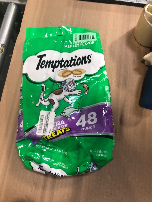 Photo 1 of **** EXP 3/27/27****** Temptations Classic Crunchy and Soft Cat Treats, Seafood Medley Flavor, 48 oz. Pouch