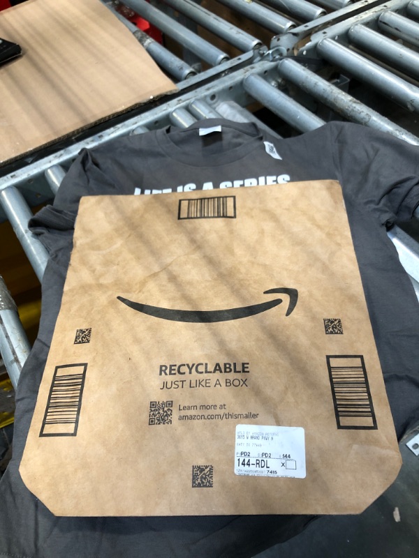 Photo 1 of  KIDS T SHIRT LARGE