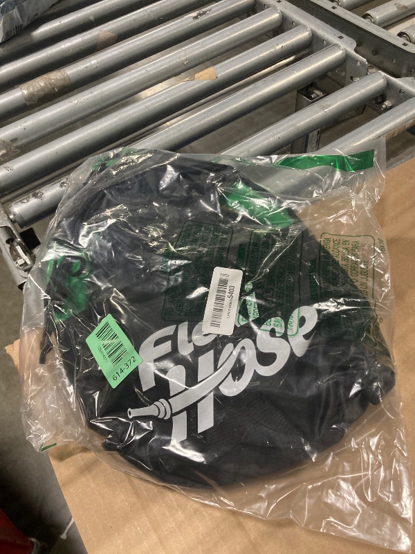 Photo 1 of ***READ CLERK NOTES*** Flexi Hose PLUS with 8 Function Nozzle Expandable Garden Hose, Lightweight & No-Kink Flexible Garden Hose, 3/4 inch Solid Brass Fittings and Double Latex Core, 100 ft Black