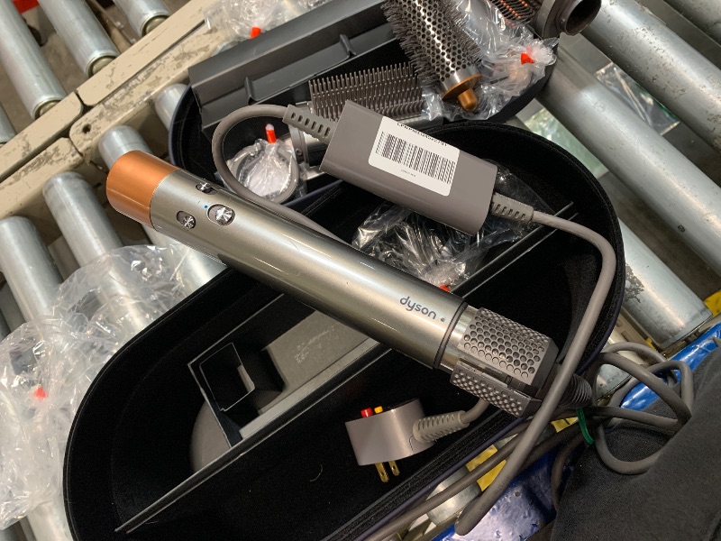 Photo 1 of ** VERY USED/ DAMAGE MINOR *** Dyson Airwrap™ Multi-Styler Complete Long, Straight to Wavy Hair, No Heat Damage, 6-in-1 Versatility