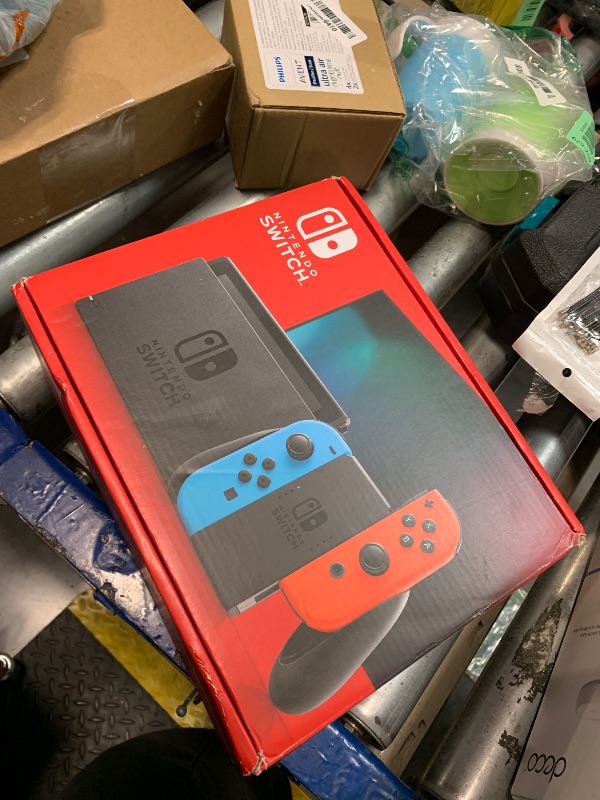 Photo 1 of ***USED/ UNTESTED ** Nintendo Switch™ with Neon Blue and Neon Red Joy?Con™