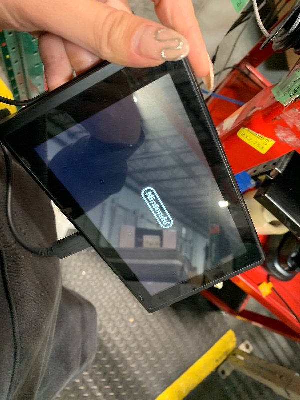 Photo 1 of ***USED/ UNTESTED ** Nintendo Switch™ with Neon Blue and Neon Red Joy?Con™