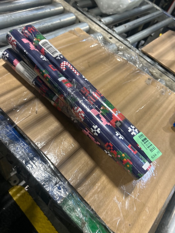 Photo 1 of *****4 PACK****
BIOBROWN Pixel Christmas Wrapping Paper - 17 Inch X 33 Feet (46.7 sq. ft. ttl.) - Santa Claus Design Perfect for Xmas, Party, Holiday Gift Wrap