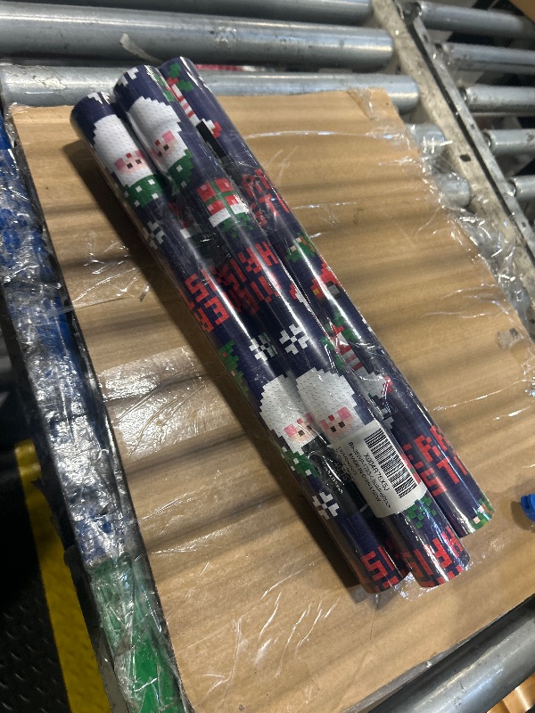 Photo 1 of *****4 PACK****
BIOBROWN Pixel Christmas Wrapping Paper - 17 Inch X 33 Feet (46.7 sq. ft. ttl.) - Santa Claus Design Perfect for Xmas, Party, Holiday Gift Wrap
