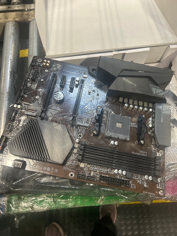 Photo 1 of ****IT HAS DAMAGE**** Gigabyte B550 Gaming X V2 (AMD Ryzen 5000/B550/ATX/M.2/HDMI/DVI/USB 3.1 Gen 2/DDR4/ATX/Gaming Motherboard)