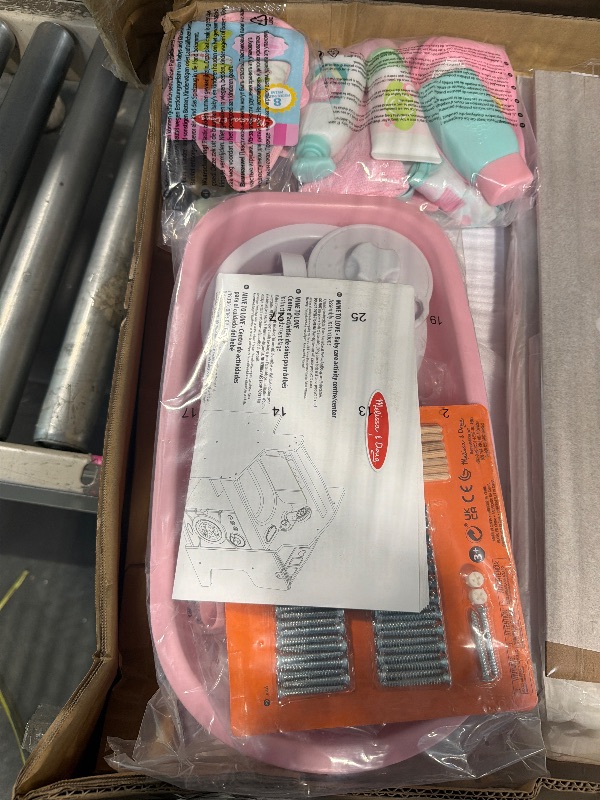 Photo 1 of Melissa & Doug Baby Care Center and Accessory Sets