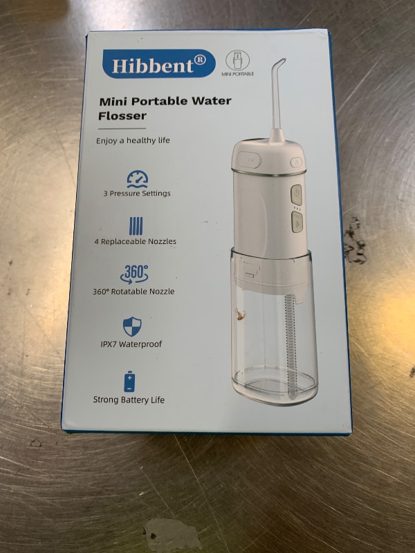 Photo 1 of Hibbent Portable Cordless Water Flosser, Mini Oral Irrigator with 3 Modes & 4 Jet Tips, IPX7 Waterproof Rechargeable Travel Electric Dental Flosser for Braces Care, Sensitive Teeth, Orthodontic