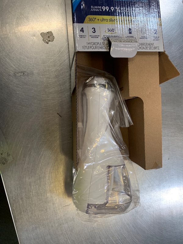 Photo 1 of Waterpik Cordless Advanced 2.0 Water Flosser For Teeth, Gums, Braces, Dental Care With Travel Bag and 4 Tips, ADA Accepted, Rechargeable, Portable, and Waterproof, White WP-580, Packaging May Vary