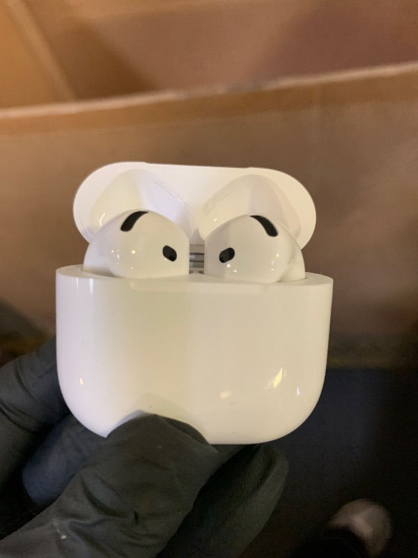 Photo 1 of **USED** Apple AirPods 4 Wireless Earbuds, Bluetooth Headphones, Personalized Spatial Audio, Sweat and Water Resistant, USB-C Charging Case, H2 Chip, Up to 30 Hours of Battery Life, Effortless Setup for iPhone