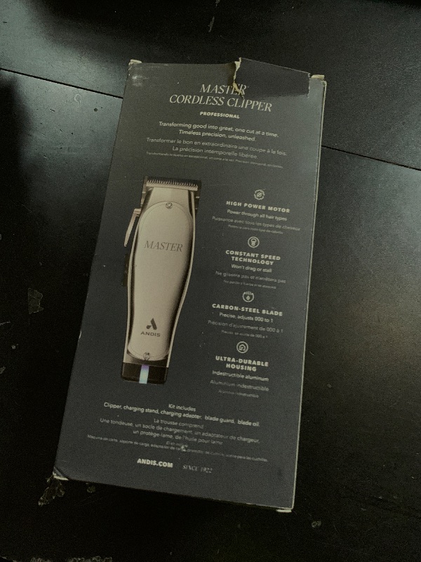 Photo 1 of Andis 12660 Professional Master Corded/Cordless Hair Clipper, Adjustable Carbon Steel Blade Hair Clipper for Close Cutting, Silver