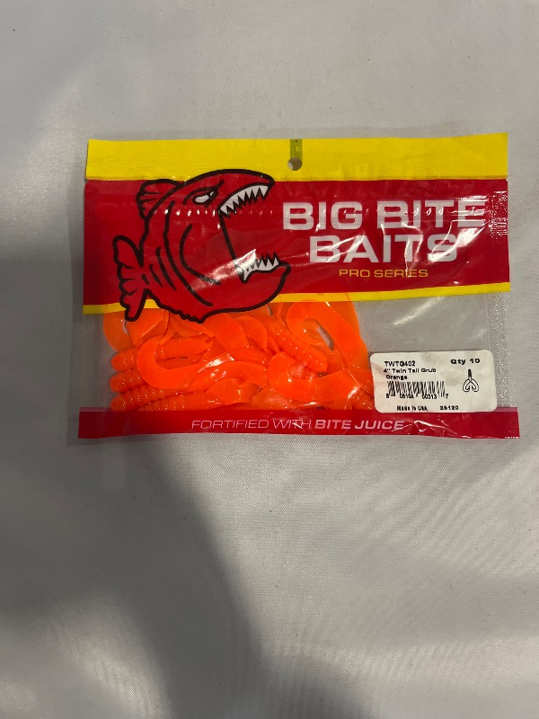 Photo 1 of Big Bite Baits 4" tein tall grub orange 10pack
