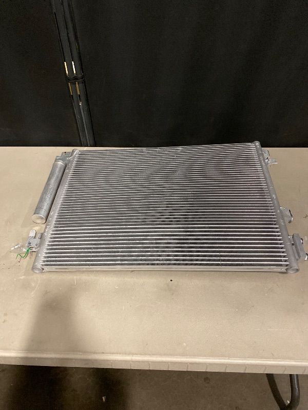 Photo 1 of Car air conditioning condenser This type of condenser is compatible with several vehicle models, including: Nissan Qashqai II, Nissan X-Trail, Renault Kadjar
