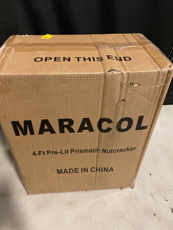 Photo 1 of 4FT Large Light-Up Giant Nutcracker Christmas Decor, Prismatic Iridescent Nutcracker Outdoor Soldier with 110 LED Pre-lit Lights, Plug-in Outdoor Nutcracker Decorations for Yard, Porch, Garden