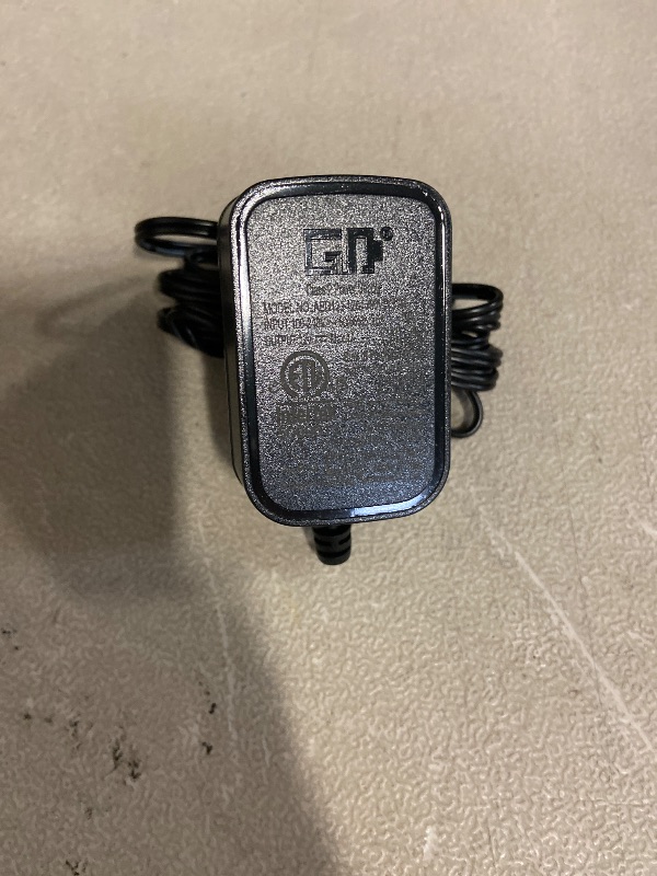 Photo 1 of Dongguan GuanQing Electronics power adapter (Model AED124-1201000/WSWO) designed for LED modules.
Input: 100-240v 50/60HZ