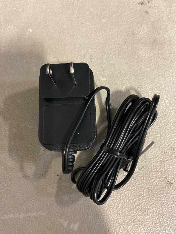 Photo 1 of Dongguan GuanQing Electronics power adapter (Model AED124-1201000/WSWO) designed for LED modules.
Input: 100-240v 50/60HZ