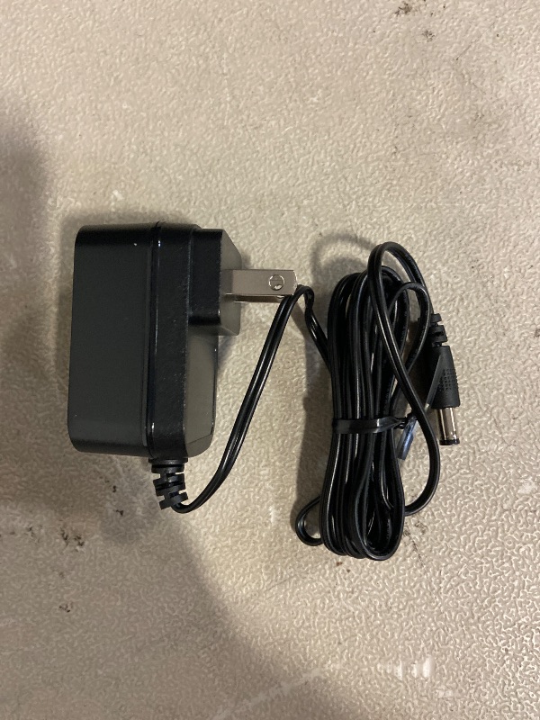 Photo 1 of Dongguan GuanQing Electronics power adapter (Model AED124-1201000/WSWO) designed for LED modules.
Input: 100-240v 50/60HZ