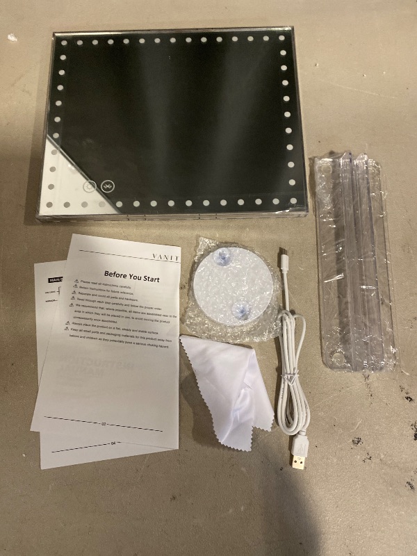 Photo 1 of VANITII Makeup Mirror with 48pcs LED Lights 12"x9" Hollywood Vanity Mirror with 3 Color Modes and Dimmable Smart Touch Light Up Mirror with 10X Magnification for Tabletop Dormitory