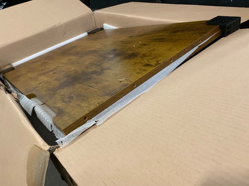 Photo 1 of Bekant hydraulic corner adjustable sit/stand desk Brown/Rustic