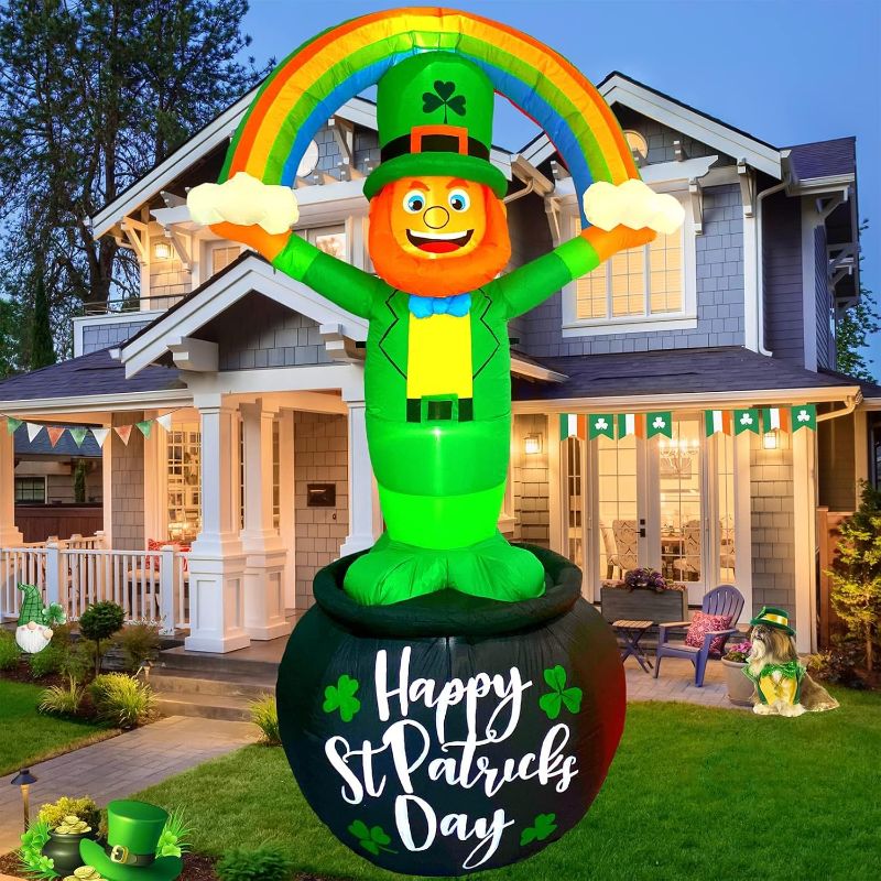 Photo 1 of 5Ft. St Patrick’s Day Giant Inflatables Outdoor Decorations Leprechaun Standing on Gold Pot Blow up Holiday Shamrocks Yard Decoration with Build-in LED Lights for Indoor Lawn Garden Party Decor *Stock image similar not same*