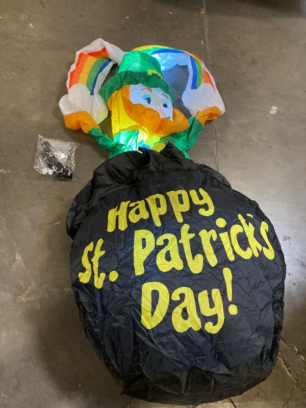 Photo 1 of 5Ft. St Patrick’s Day Giant Inflatables Outdoor Decorations Leprechaun Standing on Gold Pot Blow up Holiday Shamrocks Yard Decoration with Build-in LED Lights for Indoor Lawn Garden Party Decor *Stock image similar not same*