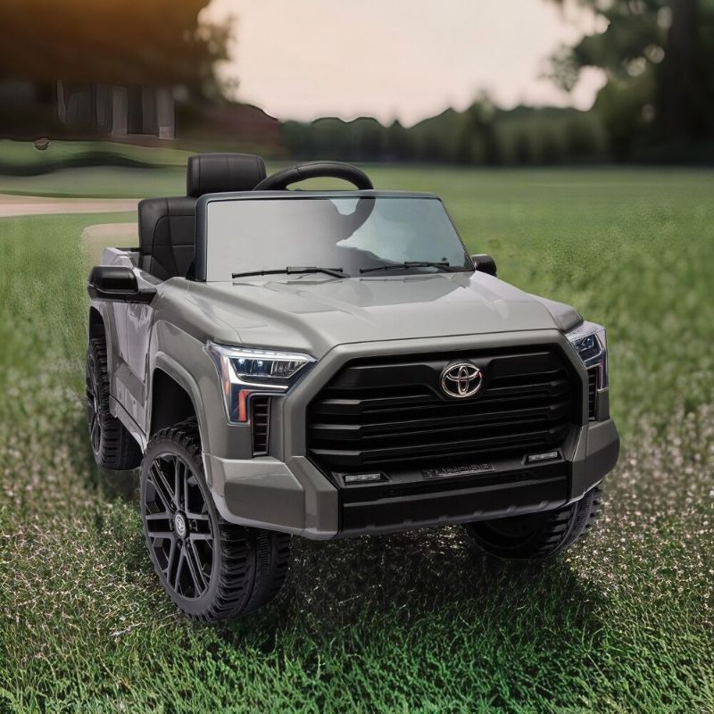 Photo 1 of 12V Ride on Car for Kids, Licensed Toyota Ride on Truck, Battery Powered Electric Car with Music, LED Lights, Suspension System, Double Doors, Safety Belt, Ride On Toys for Kids (Grey)