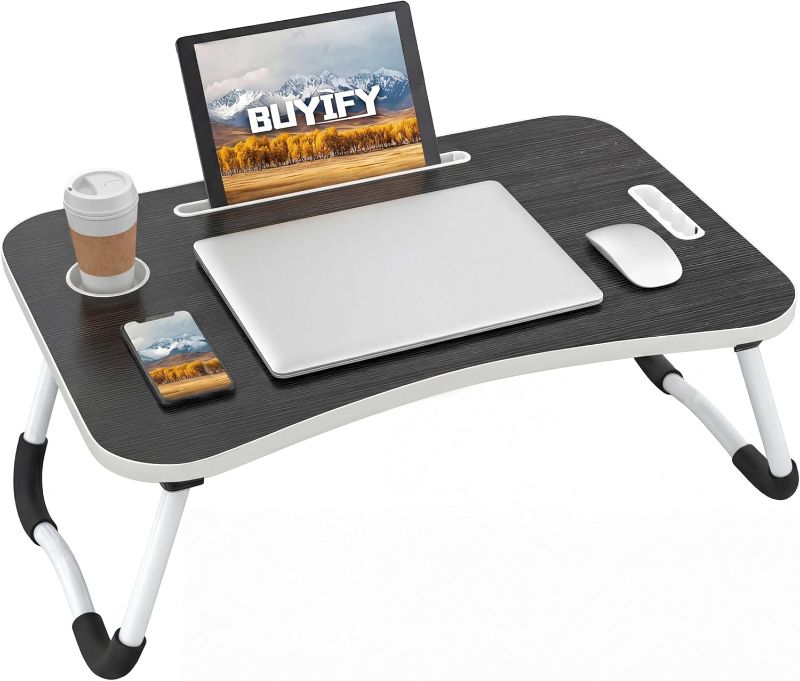 Photo 1 of Foldable Lap Desk for Laptop & Writing - 23 inch Bed Tray Table with Cup Holder & Tablet Slot - Portable Notebook Stand for Eating, Sofa, Couch & WFH Students (Black)