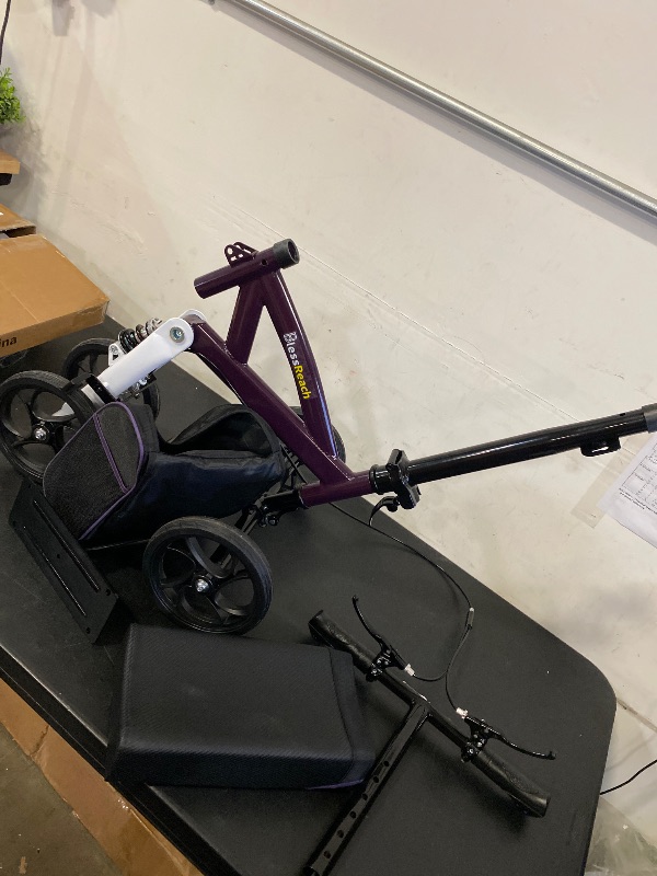 Photo 1 of BlessReach Steerable Knee Walker Deluxe Medical Scooter for Foot Injuries Compact Crutches, with Dual Rear on-Wheel Brake and Shock Absorption Under The Knee pad?Purple?