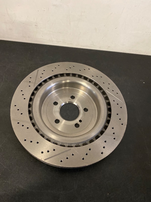 Photo 1 of 09.B879.11 UV Coated Pillar Vented drilled + Slotted Rear Brake Rotor MERCEDES-BENZ OE# A2314230212