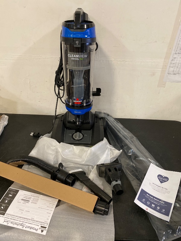 Photo 1 of Bissell CleanView Swivel Rewind Vacuum with Automatic Cord Rewind, TurboEraser Upholstery Tool, Triple Action Brush Roll, Swivel Steering, Extension Wand, Easy-Empty Dirt Tank, Multi-Cyclonic Suction