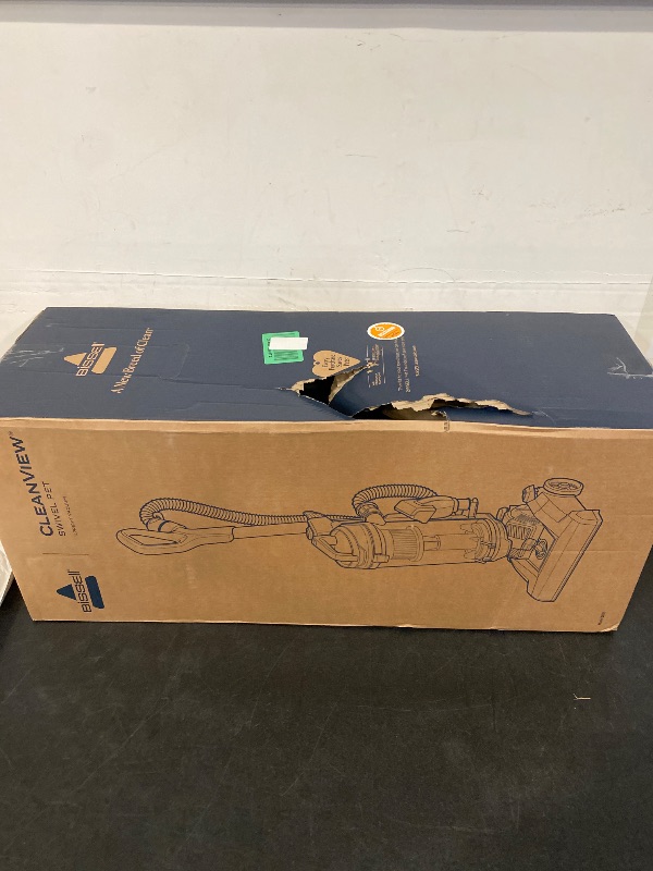 Photo 1 of Bissell CleanView Swivel Rewind Vacuum with Automatic Cord Rewind, TurboEraser Upholstery Tool, Triple Action Brush Roll, Swivel Steering, Extension Wand, Easy-Empty Dirt Tank, Multi-Cyclonic Suction